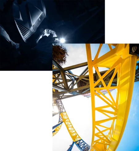 Ein Mitarbeitender der MACK Rides Fertigung mit Sicherheitshelm und eine gelbe Schiene einer Achterbahn von MACK Rides.