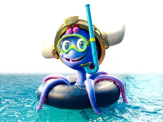 Snorri im Schwimmreifen und mit Schnorchelset. 